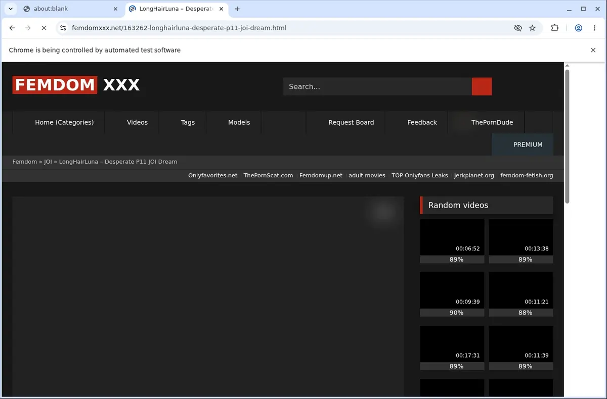 FemdomXXX Video Downloader page open in the browser